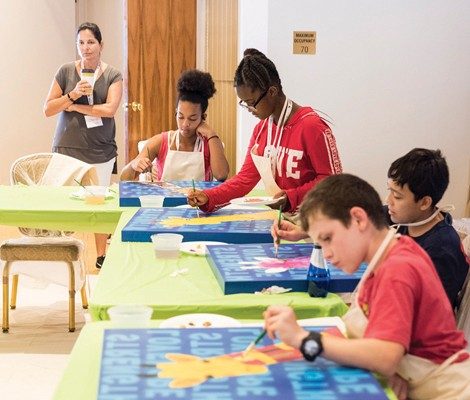 Patients and siblings alike perfect artistic skills at the Four Seasons’ camp, July 22-27: from left, Samantha Demus, patients Terrica Holmes and Christian Castillo, and James Anderwald.